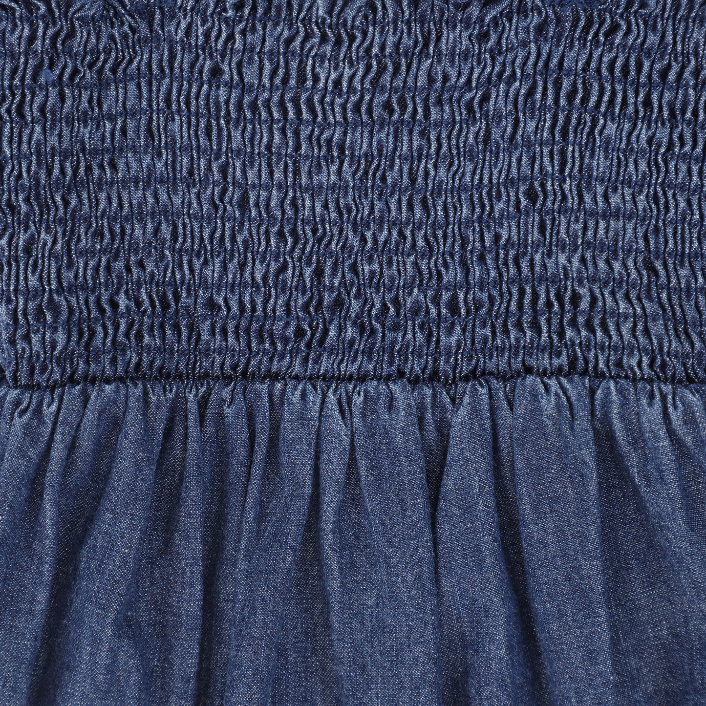 BAMBOO BLUE DENIM SMOCK ROMPER