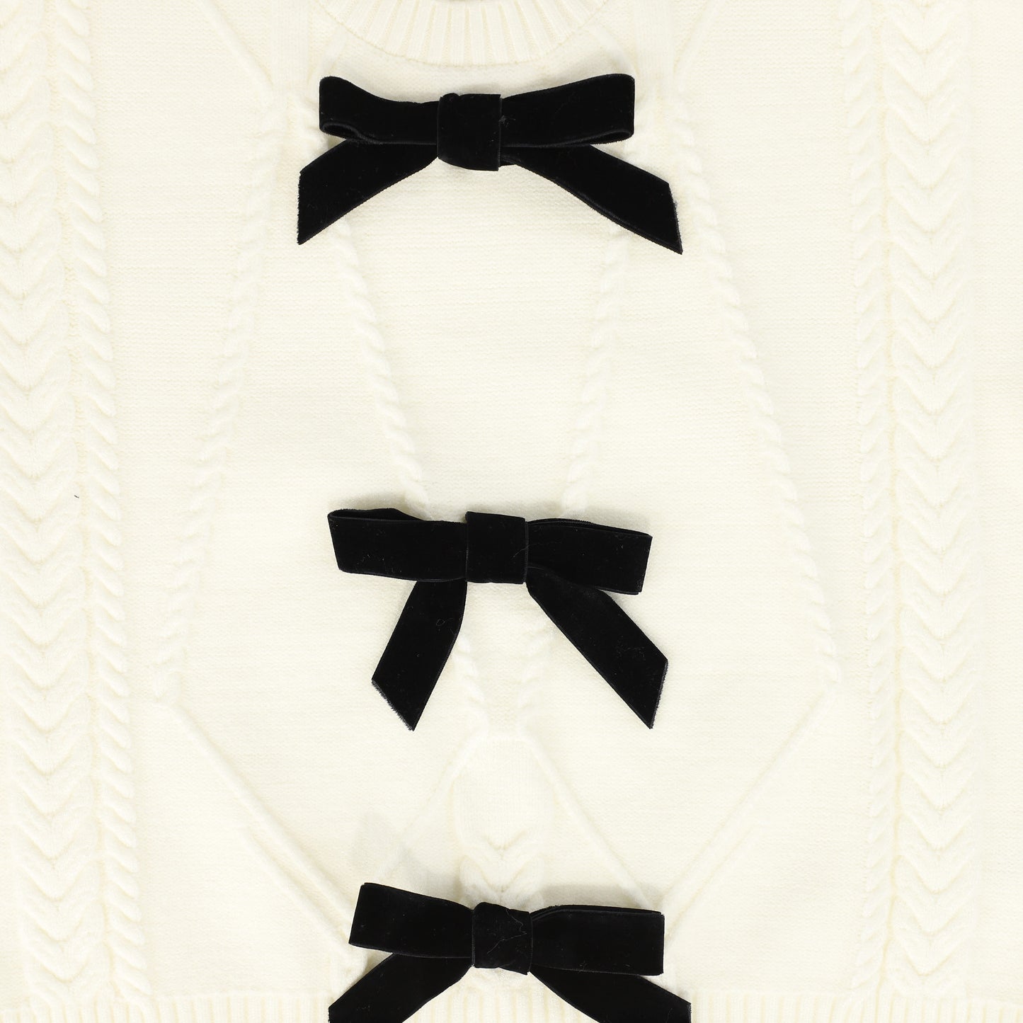 MALLORY AND MERLOT CREAM BOW SWEATER