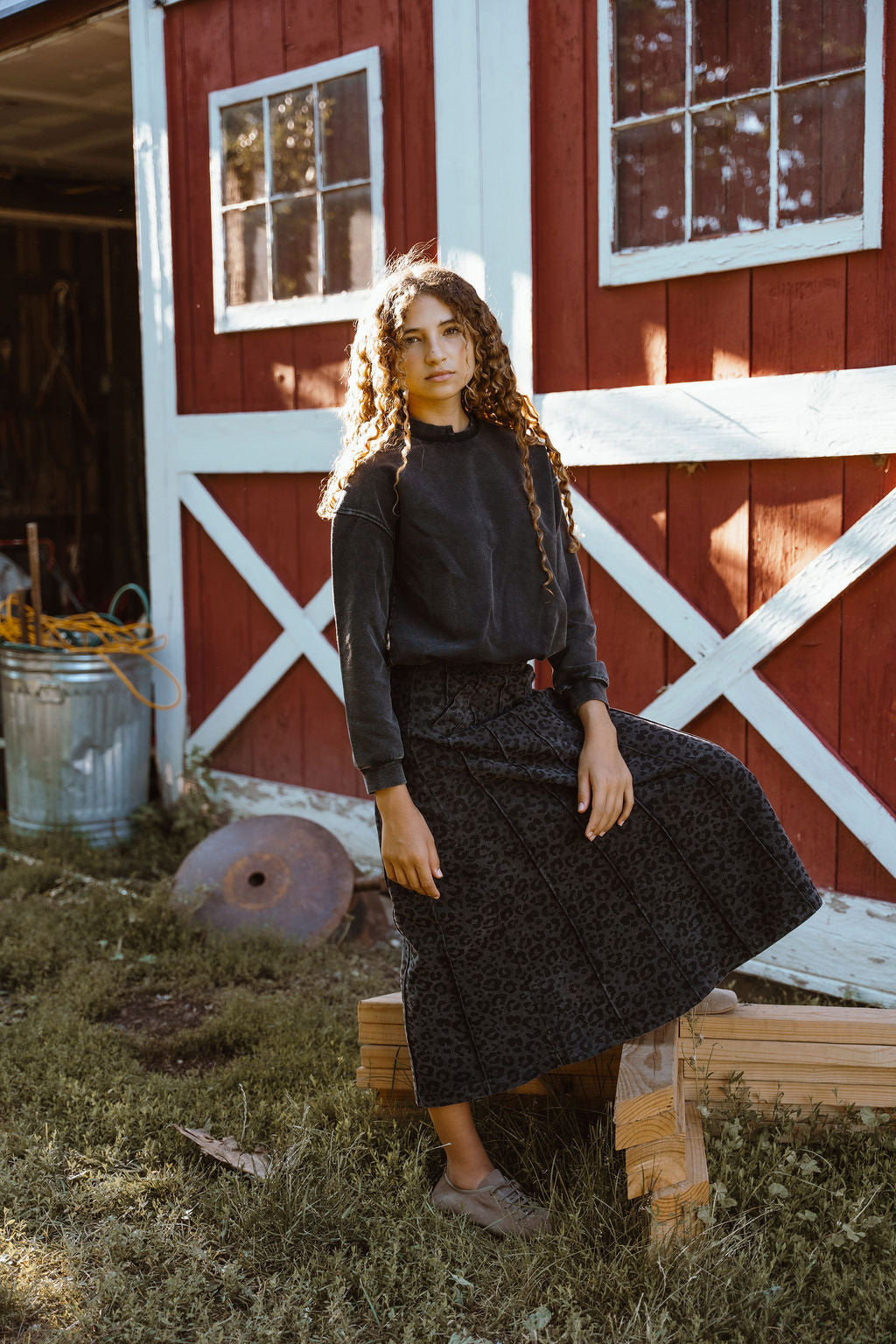 KIX BLACK DENIM ANIMAL PRINT PLEATED SKIRT