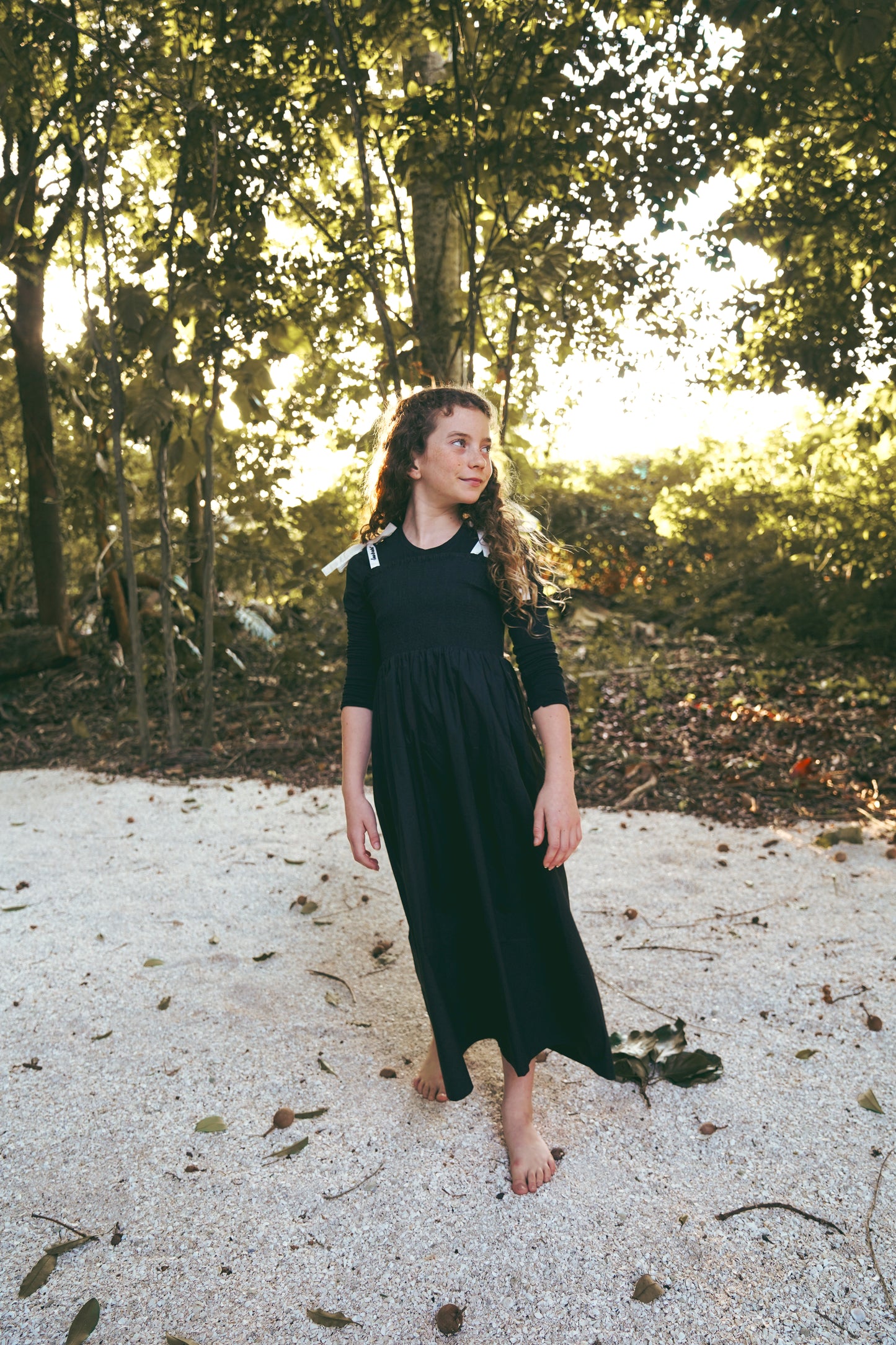 COCO BLANC BLACK SMOCKED BOW JUMPER