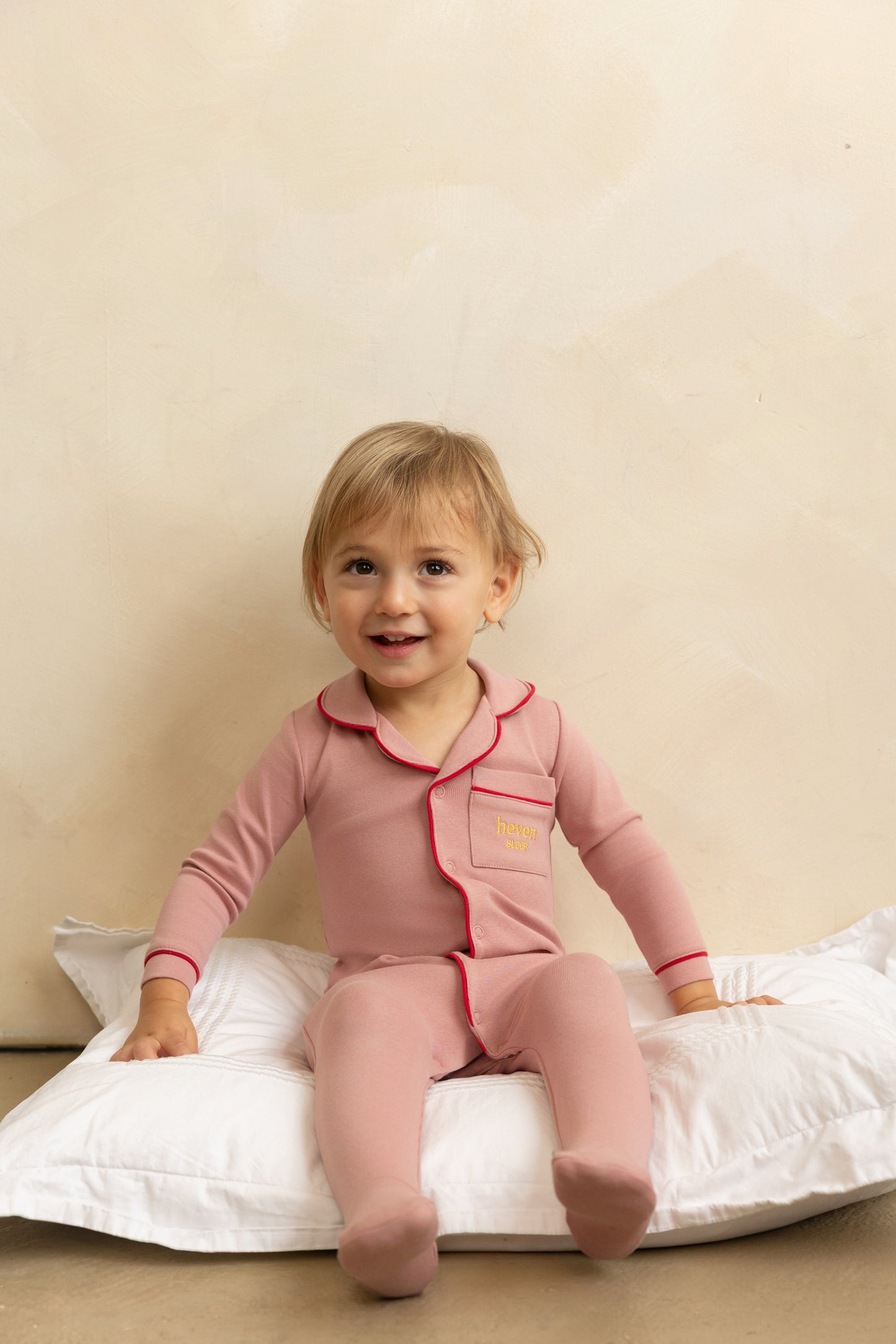 HEVEN CHILD PINK PIPED TRIM FOOTIE