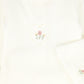 BEBE JOLEE IVORY OUTLINE EMBROIDERED FOOTIE