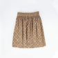 ONE CHILD CAMEL FLORAL PRINT SMOCKED SKIRT