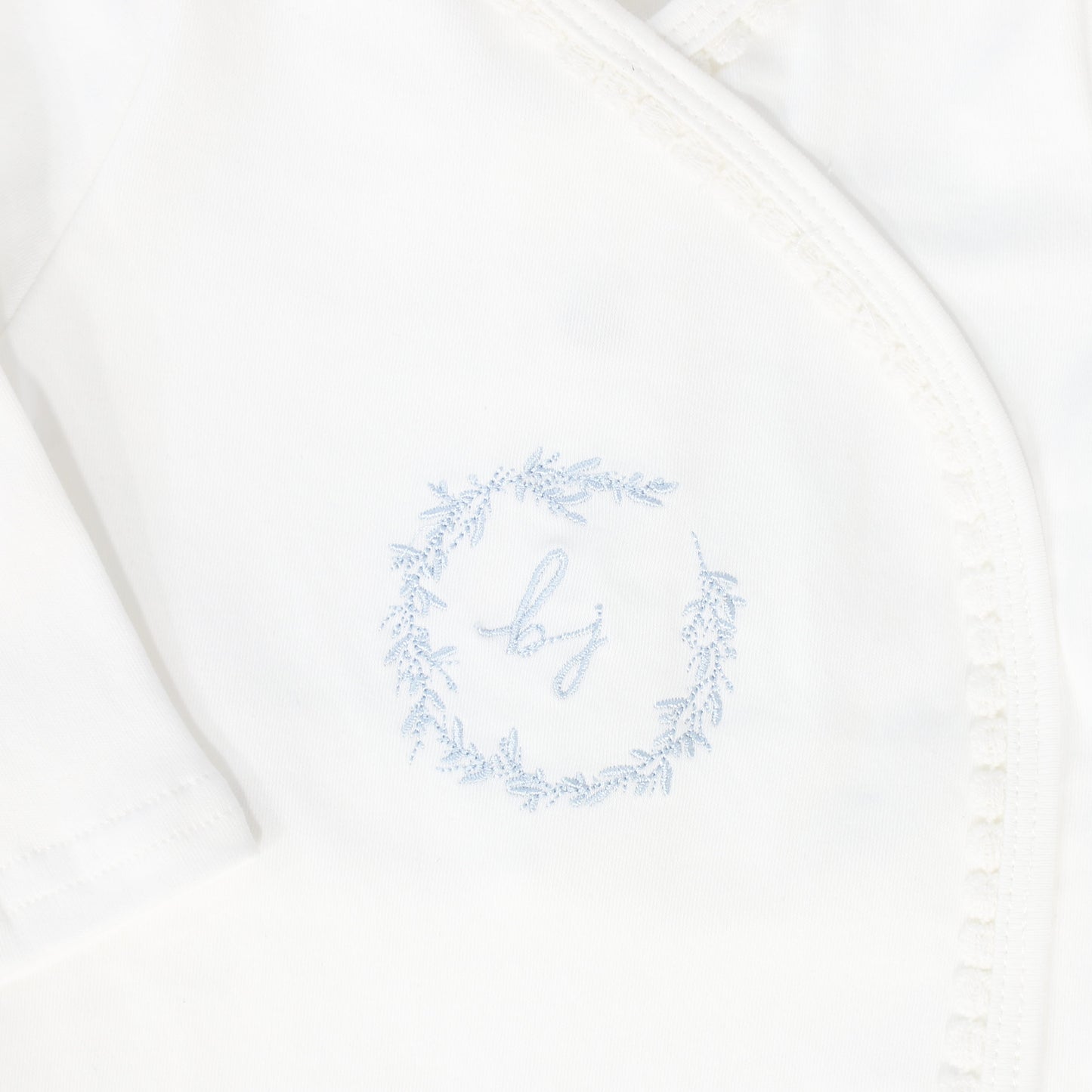 BEBE JOLEE WHITE/BLUE EMBROIDERED WRAP TRIMMED FOOTIE