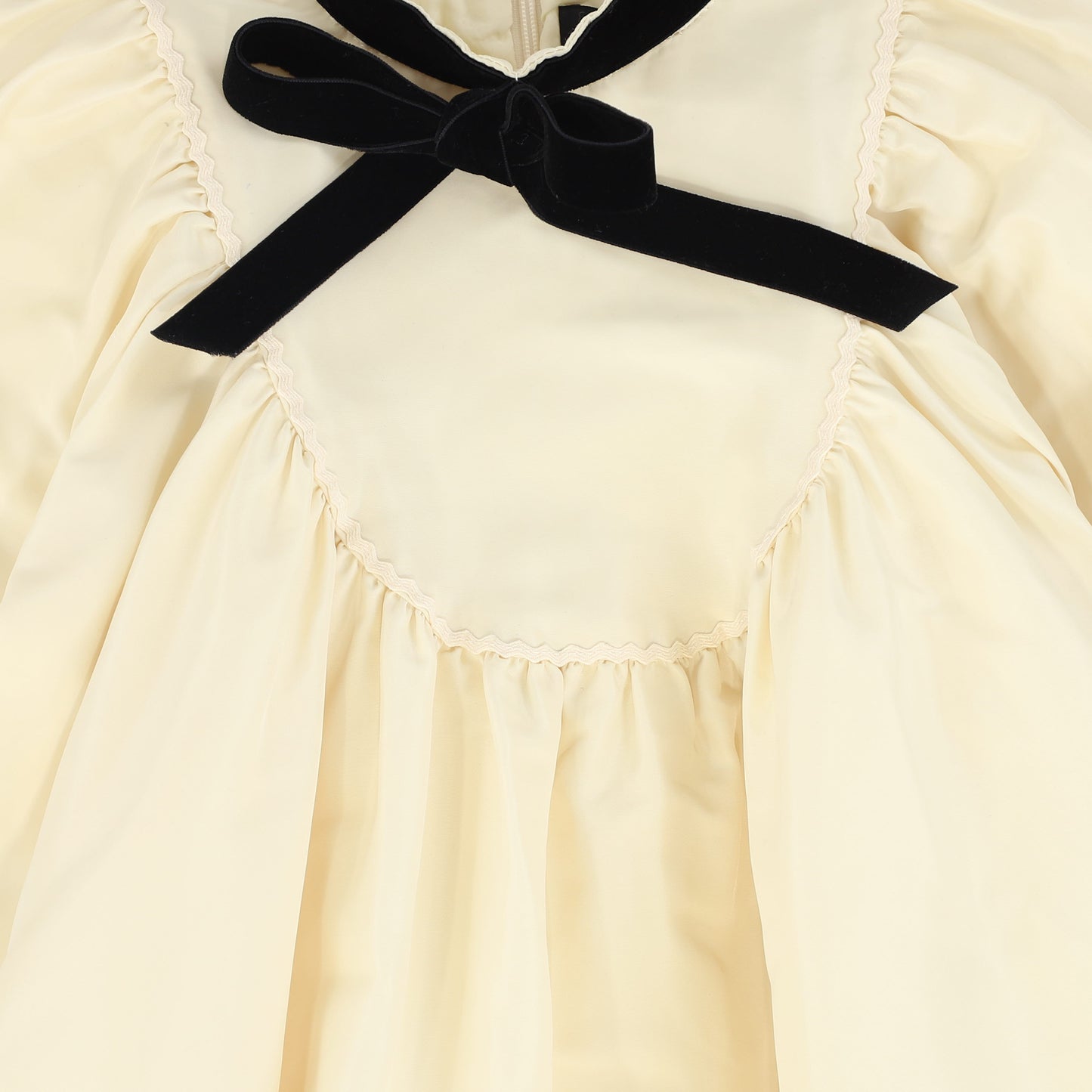 FRANCESCA GUILIANO CREAM/BLACK TAFFETA VELVET RIBBON BIB DRESS