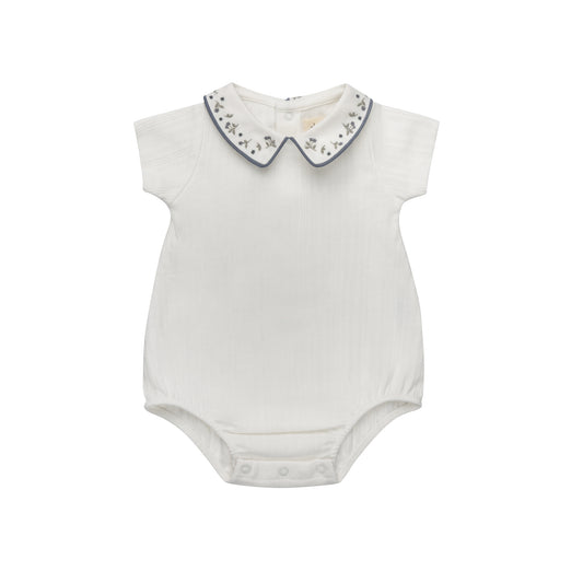 ELYS & CO IVORY/BLUE FLORAL EMBROIDERED ROMPER