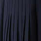 TUSTELLO NAVY PLEATED ASYMMETRICAL SKIRT