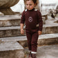 COCO BLANC BURGUNDY BUTTON DETAIL KNIT ROMPER
