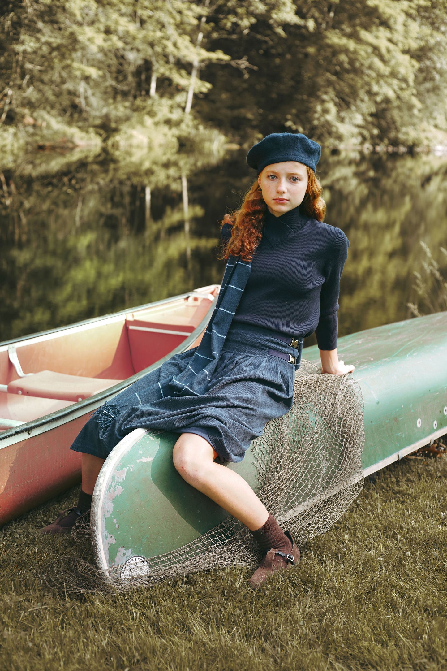 VALENTINA NAVY PLEATED BUCKLE MIDI SKIRT