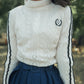 VALENTINA CREAM POINTELLE CABLE KNIT TURTLENECK