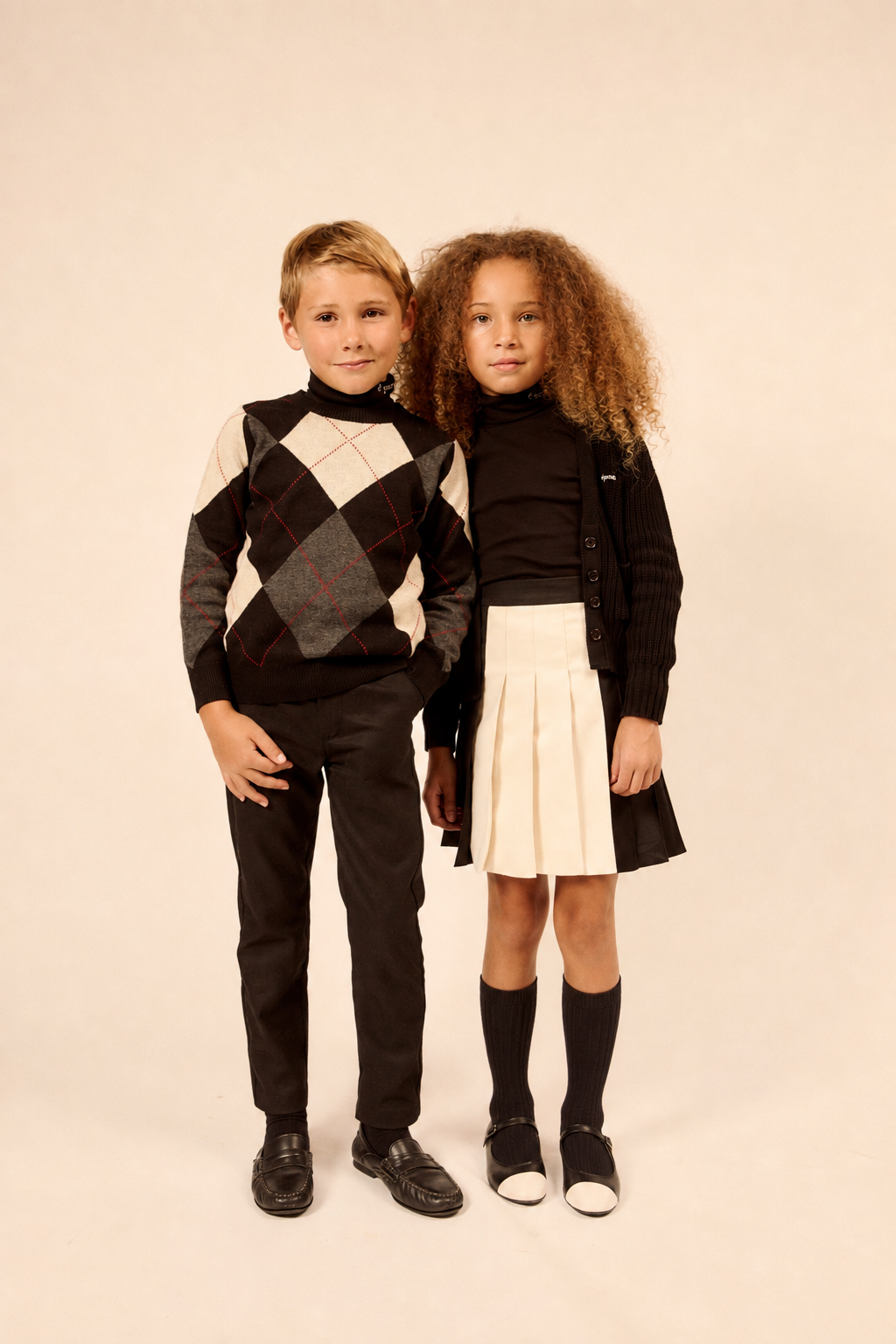 LITTLE PARNI BLACK ARGYLE SWEATER