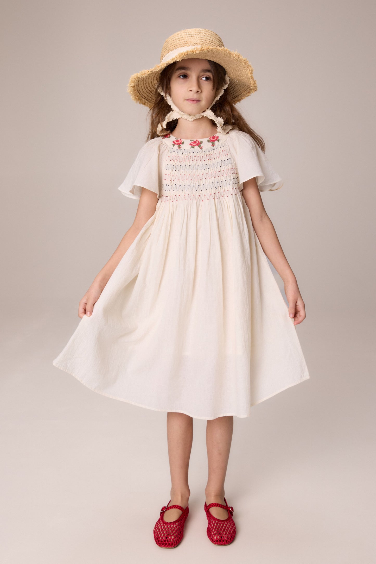 PERNILLE BEIGE/RED SMOCKED FLUTTER SLEEVE DRESS