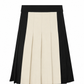 LITTLE PARNI BLACK/CREAM TWO TONE PLEATED SKIRT