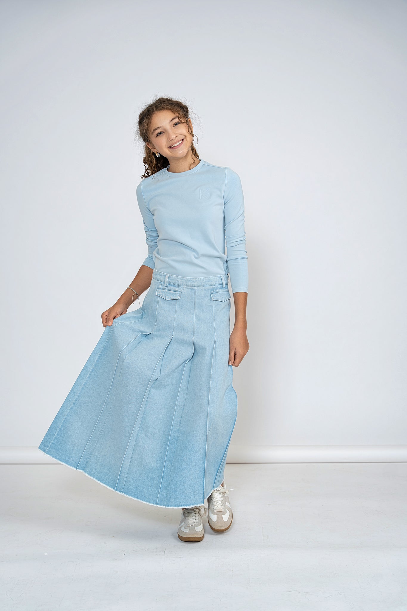 KIX LIGHT BLUE DENIM FRINGE HEM PLEAT SKIRT