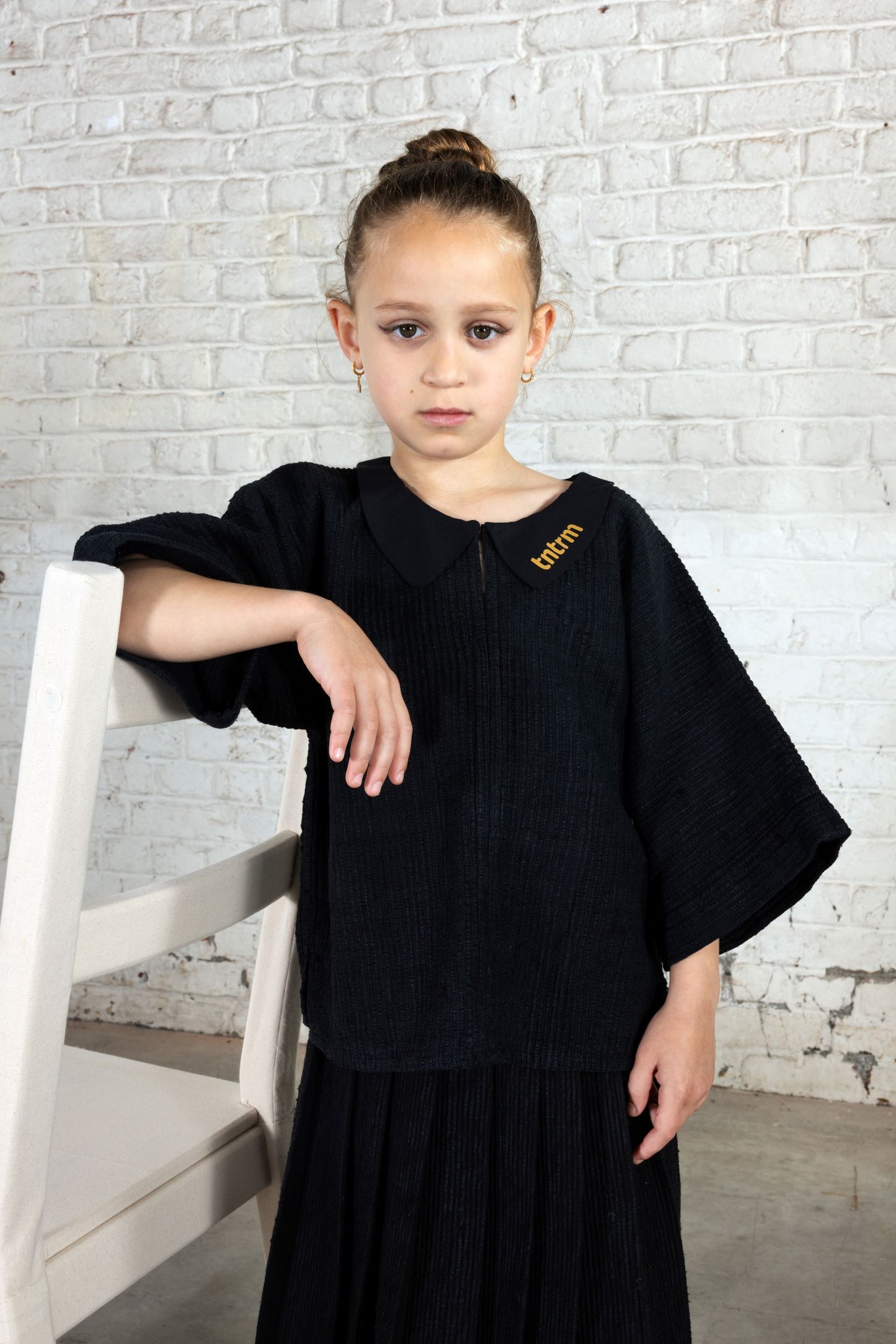 TNTRM BLACK WOVEN FLUTTER SLEEVE TOP